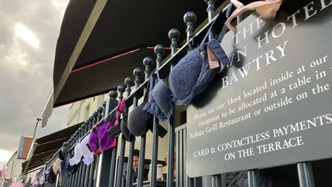 Bras outside a hotel