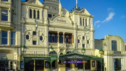The outside of the Gaiety Theatre on Douglas Promenade, which is ornately decorated and has Opera House written high above the entrance.