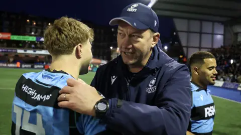 Corniel van Zyl congratulates Jacob Beetham after Cardiff win at the Arms Park