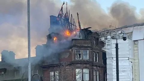 The former Ayr Station Hotel on fire
