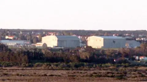 Reuters A grainy image of two large white hangars at RAF Akrotiri in Cyprus