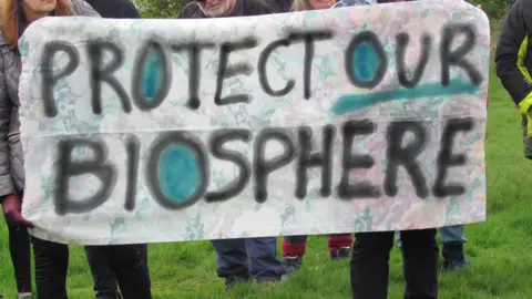 Caitlin Bennett  Signs held up at the march