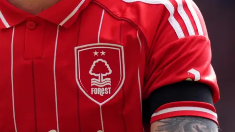 Mike Egerton/PA Wire Nottingham Forest logo