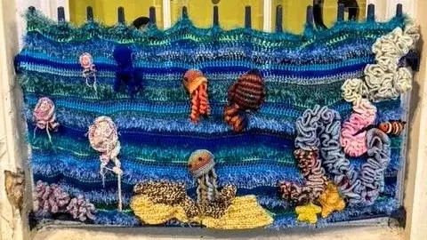 Pat Warrington Knitted seascape decorating shop window