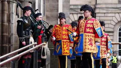 PA Media Heralds at the Thistle service in Edinburgh