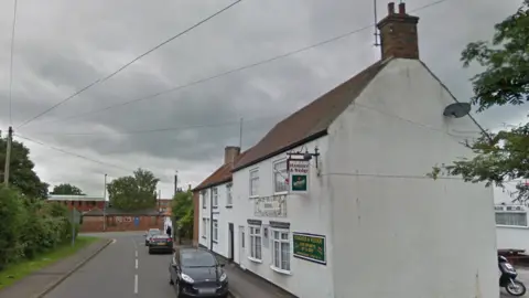 A Google street view image of the Hammer and Wedge pub in Edwinstowe