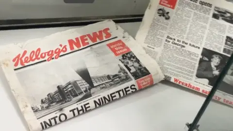 A newspaper titled 'Kellogg's News'. The headline reads: 'Into the nineties'.