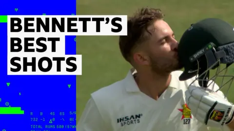 Brian Bennett kisses helmet to celebrate century