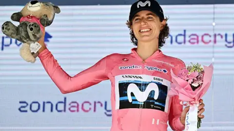 Marlen Reusser celebrating on the podium