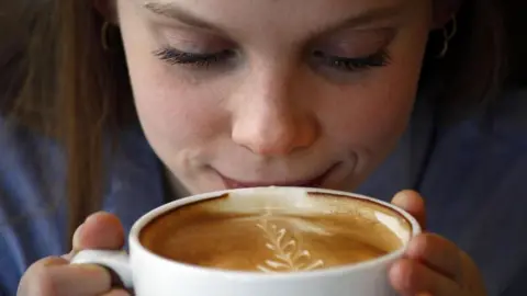 BBC Young person drinks coffee