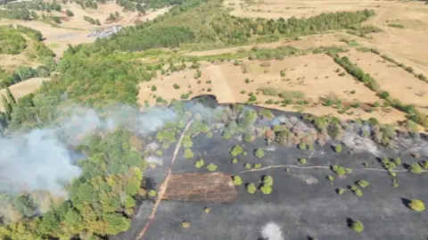 Scorched fields after a fire in Mansfield