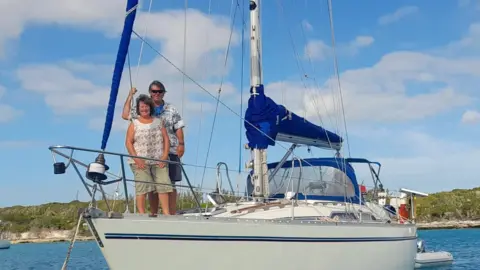 Mr and Mrs Beech on their yacht