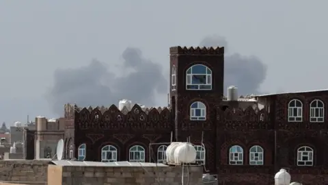 Smoke rises over Sanaa aiport, Yemen (13 July 2026)