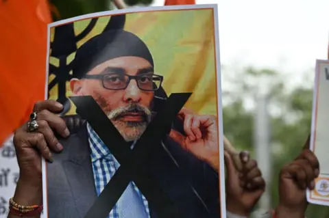 AFP A banner representing Gurpatwant Singh Pannun 