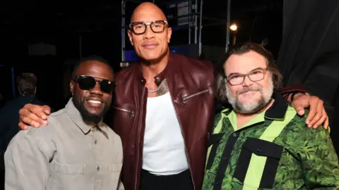 Getty Images Kevin Hart, Dwayne Johnson and Jack Black at Sony Pictures' CinemaCon 2026 at The Colosseum at Caesars Palace on April 13, 2026 in Las Vegas, Nevada. 