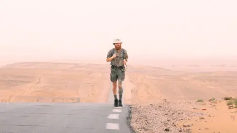 GUUS VAN VEEN Russ Cook running in Africa