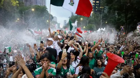 Mexico fans celebrate exuberantly