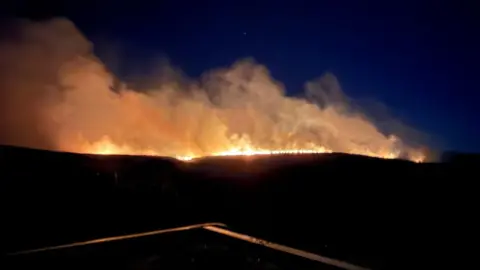 Peak District Moorland Group Wildfire off Snake Pass in the Peak District, near Glossop, Derbyshire, on Thursday 30 April 2026.