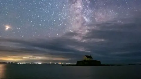 Getty Images St Cwyfan's Church and the Milky Way