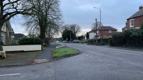 Roads in Smalley with houses on 