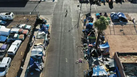 Getty Aerial view of tents scattered along a road