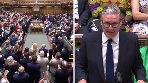 Composite image showing most of the Commons, aside from the front opposition bench and a few others, standing and clapping and Starmer smiling
