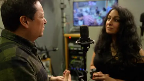 Playwright Nick Ahad and Comedian Seeta Wrightson in the recording studio for a new radio play concerning Bradford's culture