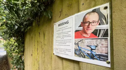 A missing poster regarding Martyn Richardson. It has a picture of him and his bike.