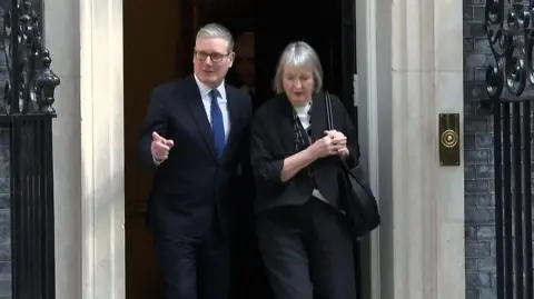 PA Media Prime Minister Sir Keir Starmer with former deputy Labour leader Baroness Harriet Harman on the steps of 10 Downing Street.