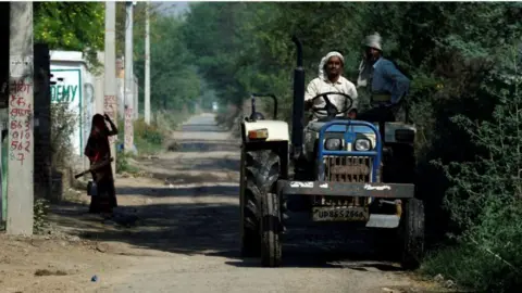 Reuters Indian farmer up