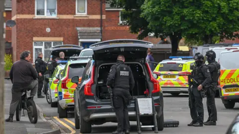 Robert Melen large police presence in the street following the attack