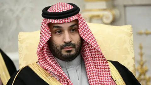 Getty Images Crown Prince Mohammed bin Salman looks on during a meeting with US President Donald Trump (not pictured) in the Oval Office of the White House in Washington, DC on November 18, 2025. 