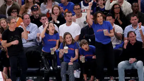 AFP via Getty Images Alana Haim, Este Haim, Taylor Swift, and Mariska Hargitay attend Game Four of the 2026 NBA Finals between the San Antonio Spurs and the New York Knicks at Madison Square Garden.