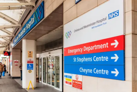 Getty Images A side view of the entrance to the Chelsea and the Westminster Hospital with the sign to its A&E department in the foreground 