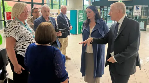 BBC Emma Little-Pengelly and Gregory Campbell meet healthcare workers