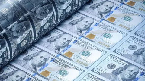 100 dollar bills being printed