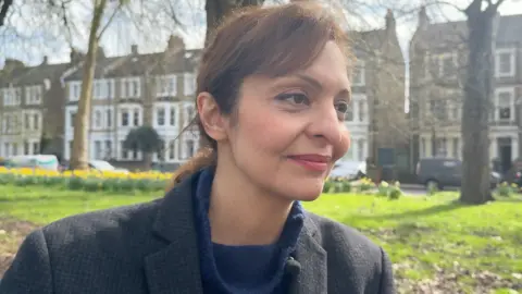 BBC/Olga Sawczuk Close-up of Atoosa Sepehr, who is in a park wearing a blazer and blue sweater