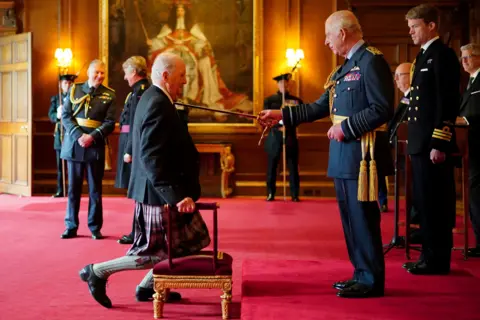 PA Prof Sir Alexander McCall Smith is made a Knight Bachelor by King Charles III 