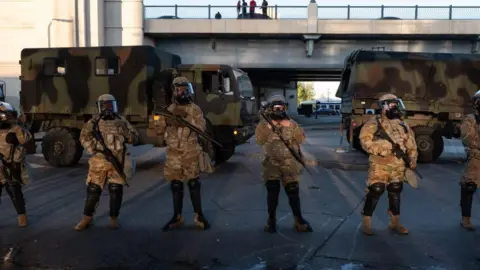 Getty Images National Guard troops in Minnesota in 2020 