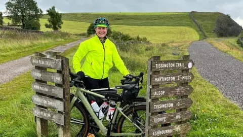 Northern Lincolnshire and Goole NHS Foundation Trust Jenny Smith with her bike in the countryside