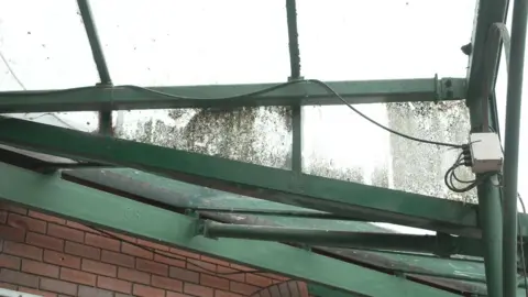 An exterior roof/window with dirt on it