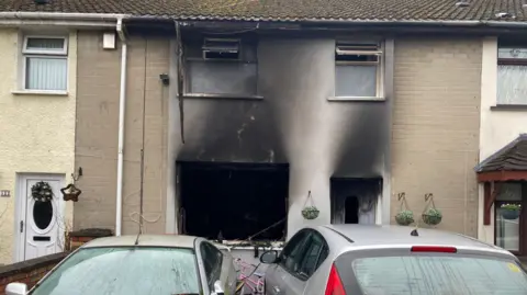 A house that has been damaged by a fire.