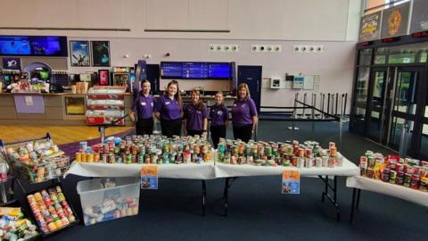 Staff at Parkway Cinema in Cleethorpes with food bank donations