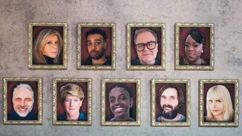Pictures on a wall featuring the faces of contestants in Celebrity Traitors