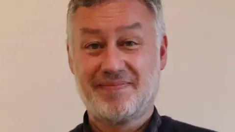 Wilf Ward Family Trust Paul McCay smiles at the camera.