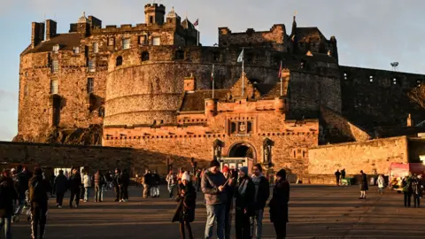 Getty Images Tourists outside Edinburgh Castle on December 30, 2025