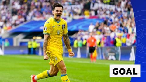 Ukraine's Mykola Shaparenko celebrates his goal 