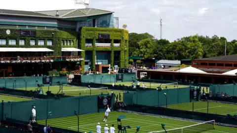 PA Media Players practice on tennis courts at Wimbledon championships.