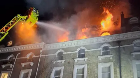 London firefighters tackle a blaze in a block of flats