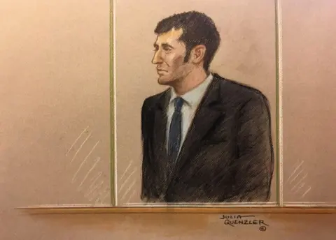 Julia Quenzler / BBC An artist's drawing of Carrick in the dock in court. He stands behind a screen and wears a black suit and tie.